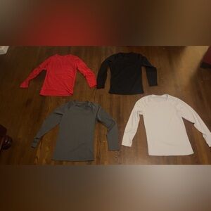 4 athletic compression shirts in one red,black,grey and white